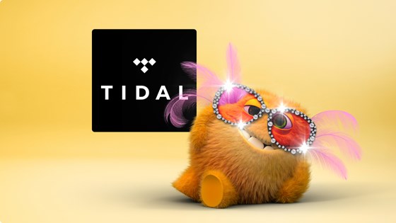 Udklædt CBB bamse ved siden af Tidal logo